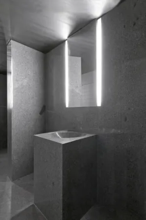 exhibition room with visible rocks