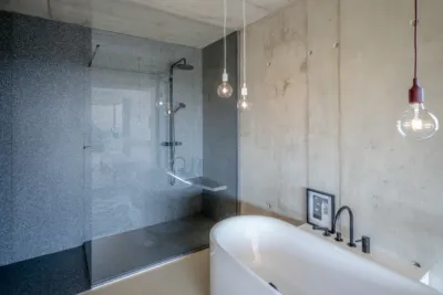 Bathroom made out of dark granite