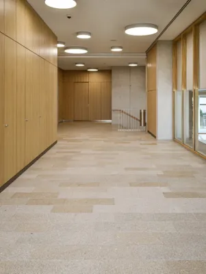reddish-yellow flooring in a corridor