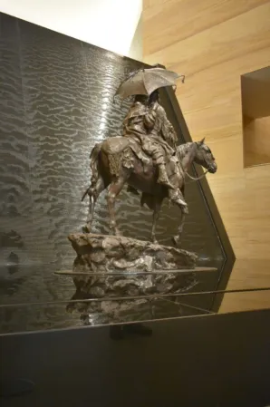 water wall made of black granite in a museum