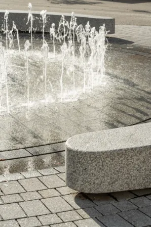 fountain field made of granite with benches