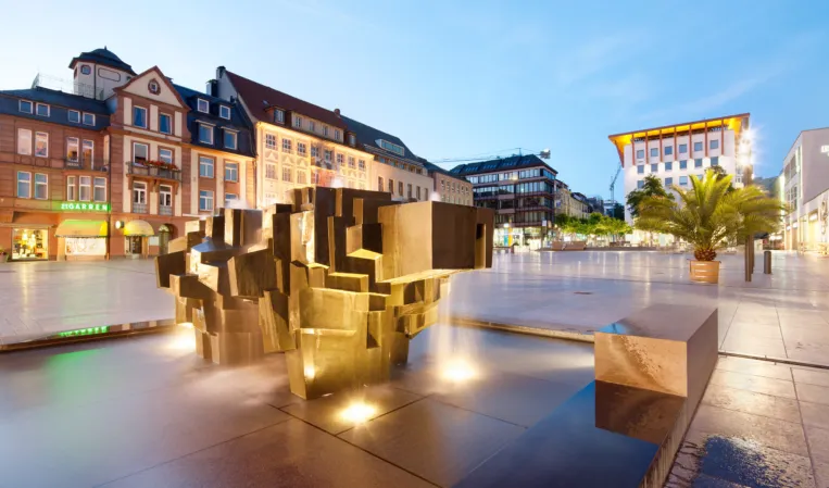 Fountain on a public plaza by night