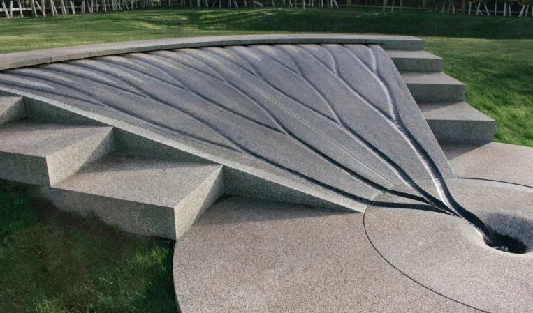 water feature made of granite with channel flows