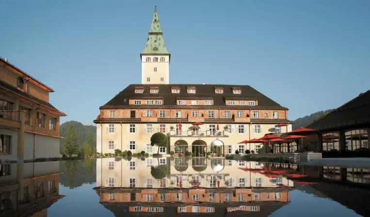 Schloss Elmau reflected in water