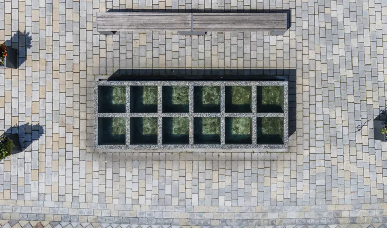 Top view of a fountain with a grid aesthetic