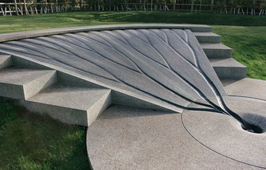 water feature made of granite with channel flows
