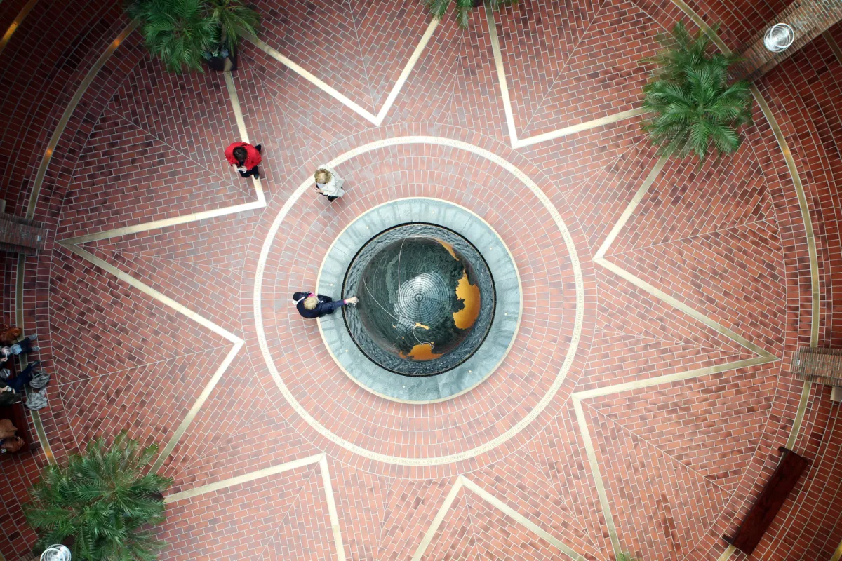 Rotating granite sphere in a fountain installation viewed from above