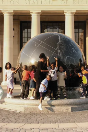 Children with floating sphere at the Science Museum of Virginia