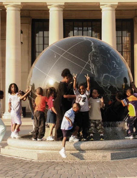 Children with floating sphere at the Science Museum of Virginia