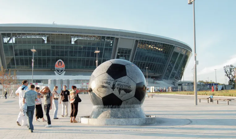 Floating sphere with football design in front of the stadium in Donetsk