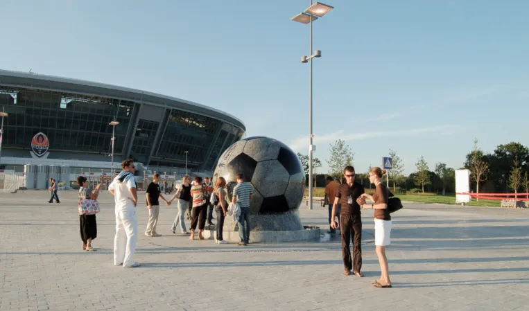 Floating sphere with football design in front of the stadium in Donetsk