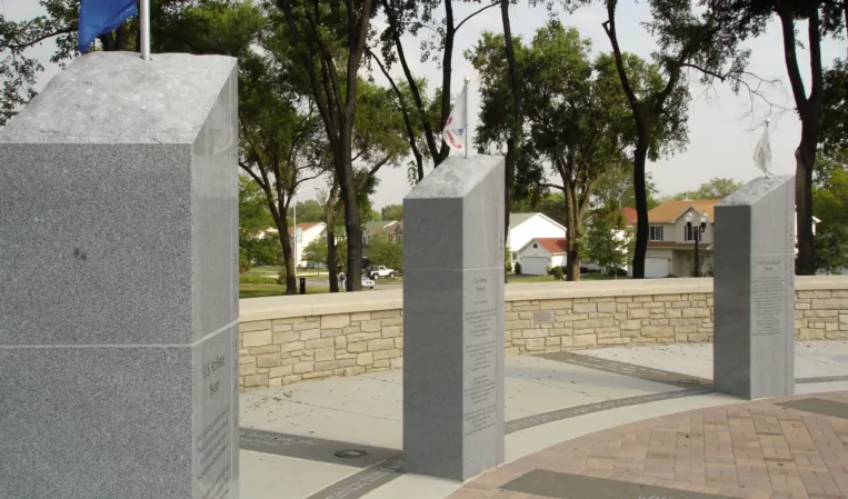 Granite columns with memorial inscription