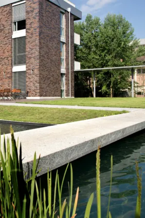 Granite pond bridge without railing