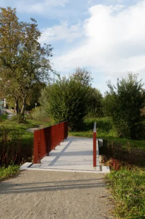 Granite pedestrian bridge with side lighting and interesting play of light