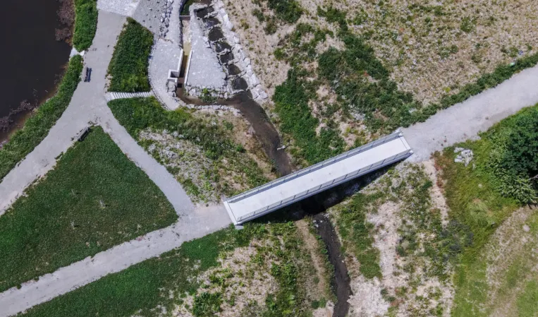 Bird’s-eye view of a bridge crossing a reservoir