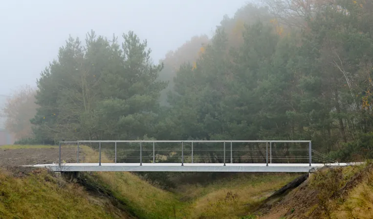 Granite bridge in fog