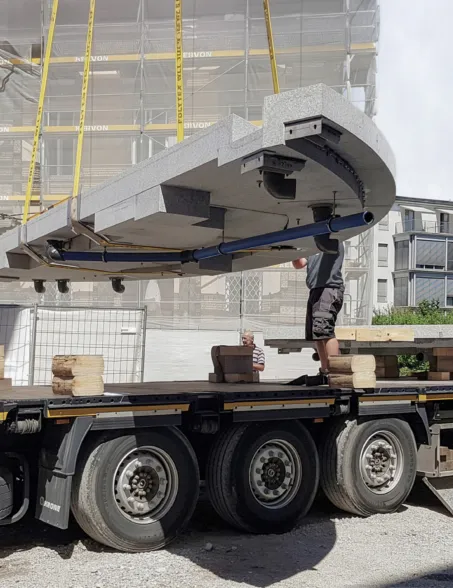 Finished fountain module being unloaded by crane