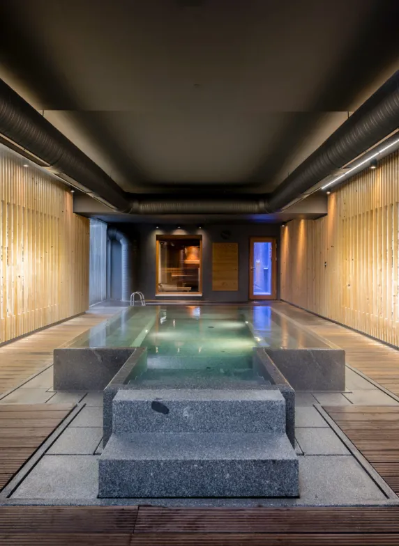 Stone whirlpool with steps for easy entry