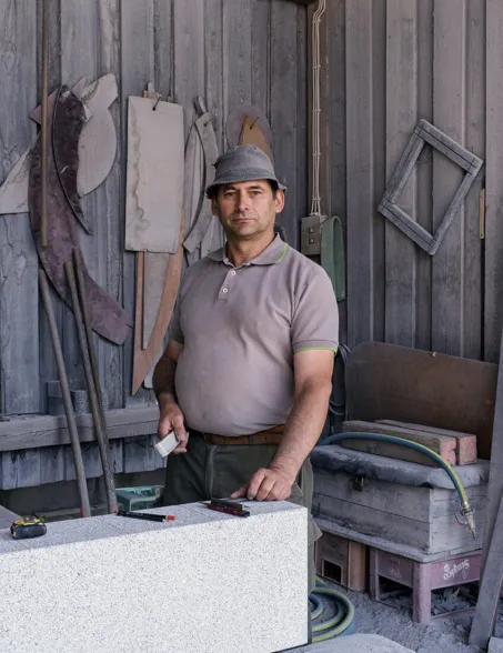 stonemason working in a traditional stone workshop