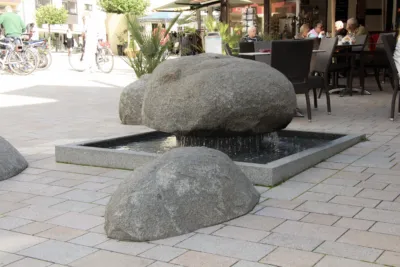 fountain installation with wobbling boulders