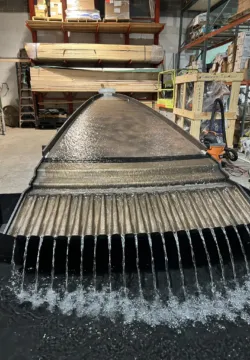 a mockup of a fountain made from steel to test the water flow