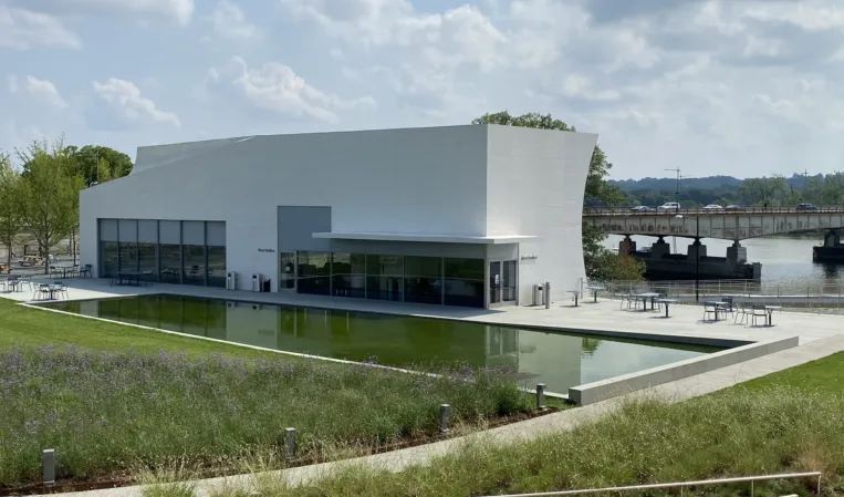 Rectangular reflecting pool with granite edges beside a the kennedy center