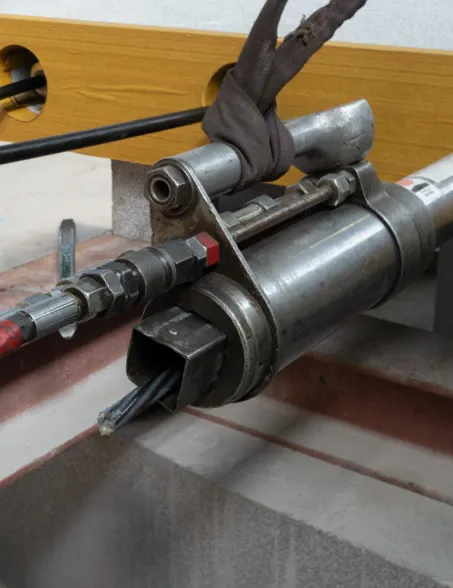 A tool used to post-tension granite bridges