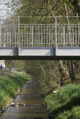a leteral mounted railing for a granite bridge